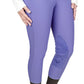 TuffRider Ladies Ribb Knee Patch Breeches- Sage- 24 worn by model showing side zip pocket and ribbed knee patch design