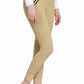 Woman wearing beige TuffRider Tiffany Ribbed Breeches with Silicone Full Seat - Women's Riding Pants standing barefoot
