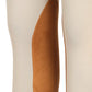 Close-up of tan knee patch detail on TUFFRIDER CHILDREN'S PRIME JODHPURS WITH BELT LOOPS equestrian pants