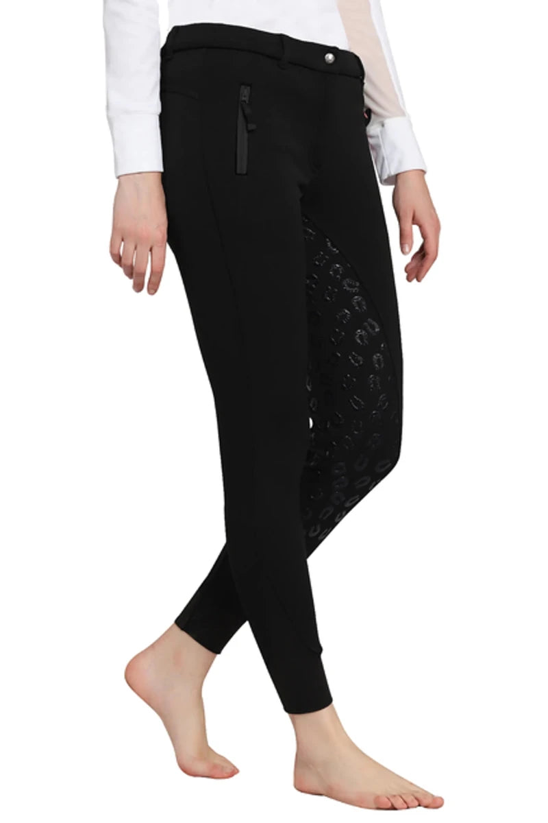 Model wearing black TUFFRIDER LADIES MACY WINTER BREECHES with zipper pocket and silicone grip knee patches