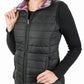 Woman wearing a black TuffRider Ladies Combination Reversible Vest with purple plaid lining and front zipper closure