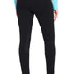 TuffRider Ladies Cotton Pull-On Knee Patch Plus Breeches in black shown from the back on model wearing turquoise shirt