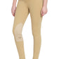 Model wearing tan TuffRider Ladies Cotton Pull-On Knee Patch Plus Breeches with black top, barefoot on white background