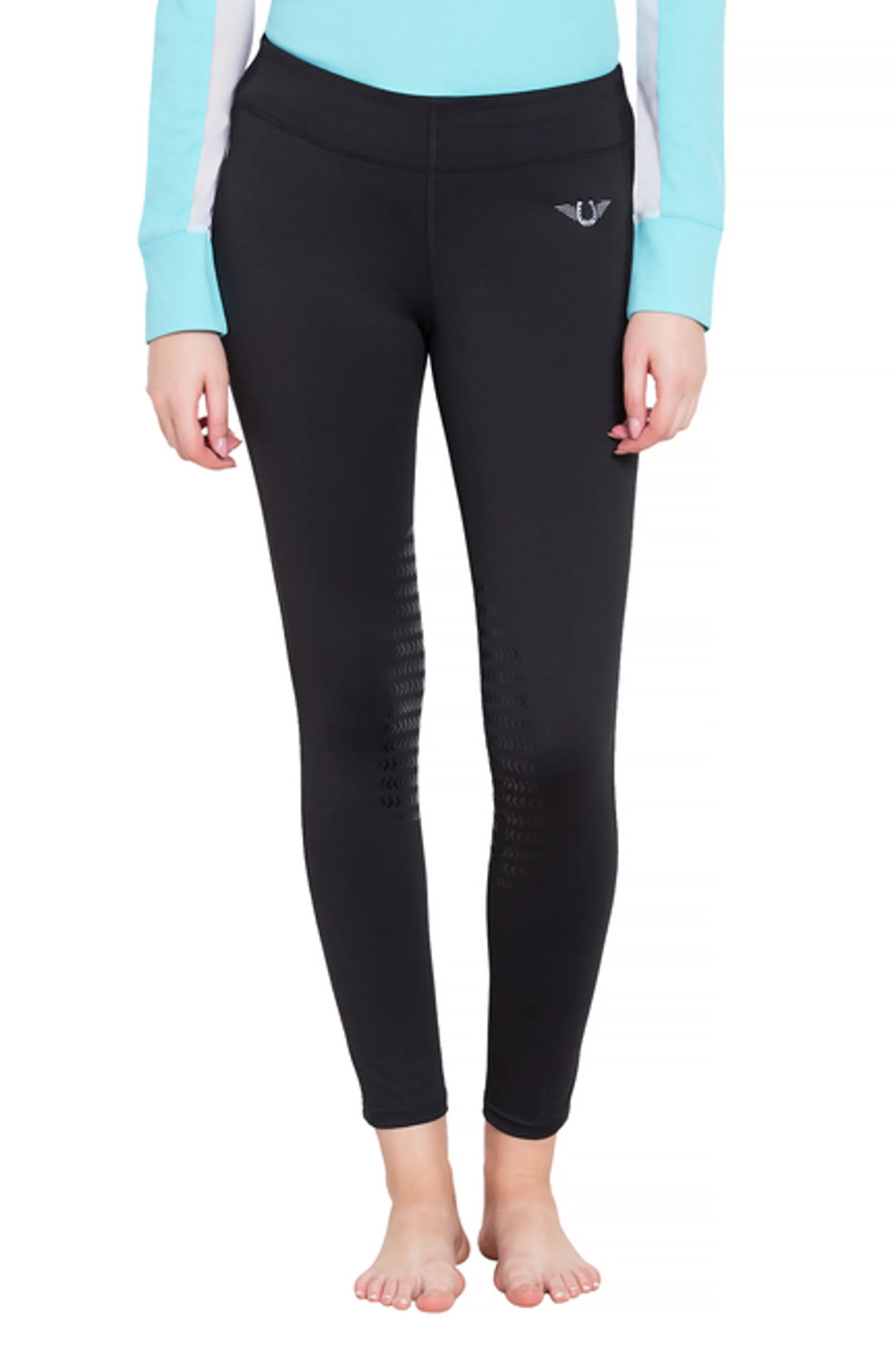 TuffRider Ladies Ventilated Schooling Tights in black with grip detailing, modeled barefoot and paired with a light blue top.
