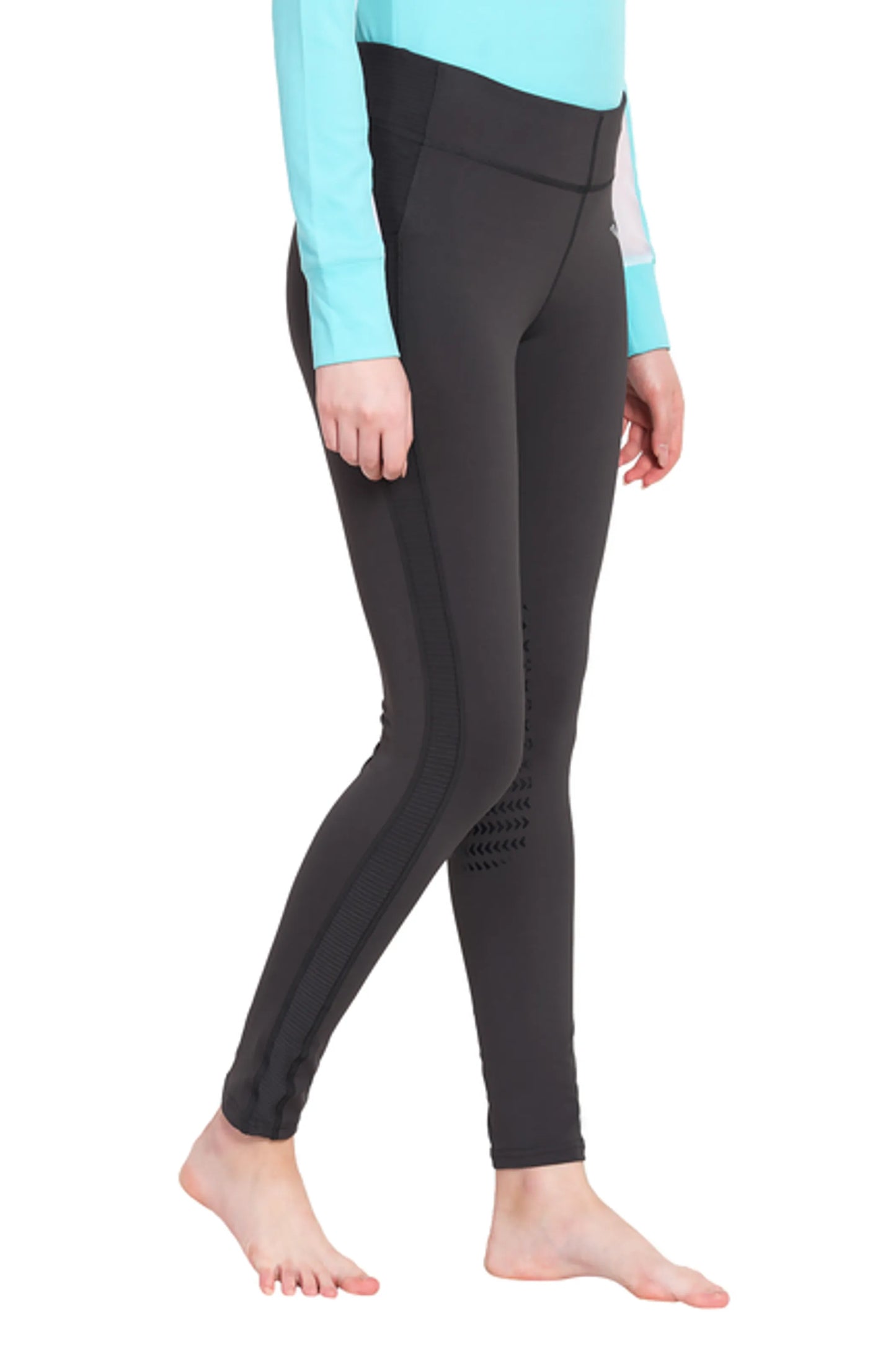TuffRider Ladies Ventilated Schooling Tights shown in black with breathable panels, modeled barefoot from side view.