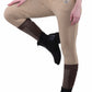Close-up of a person wearing TuffRider Ladies Ventilated Schooling Tights in tan with black riding boots and a red top.