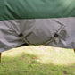 TuffRider Bonum 1200D Medium Weight Standard Neck Two Tone Turnout Blanket With 200gms of fill draped on horse outdoors