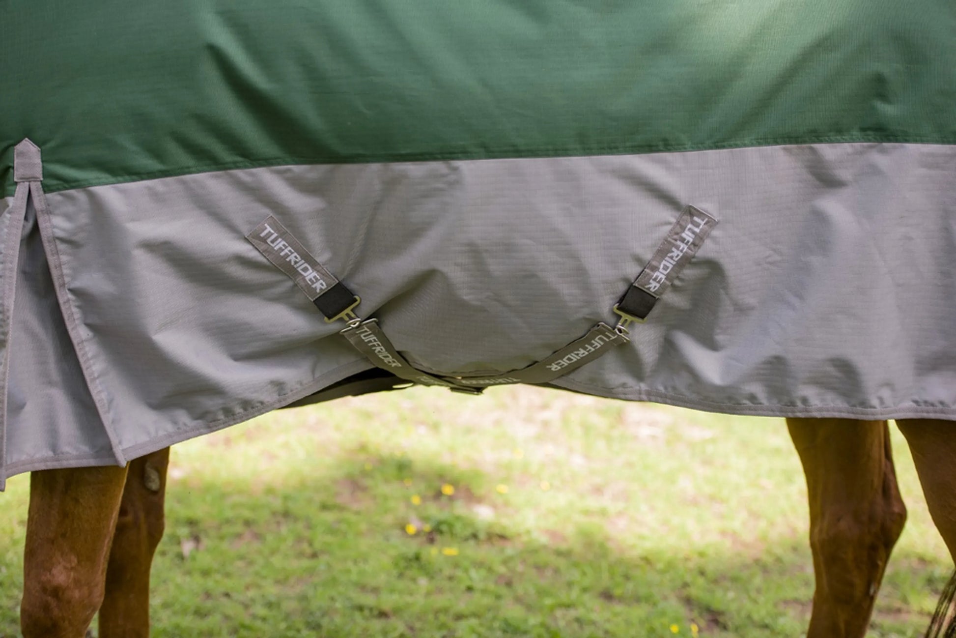 TuffRider Bonum 1200D Medium Weight Standard Neck Two Tone Turnout Blanket With 200gms of fill draped on horse outdoors