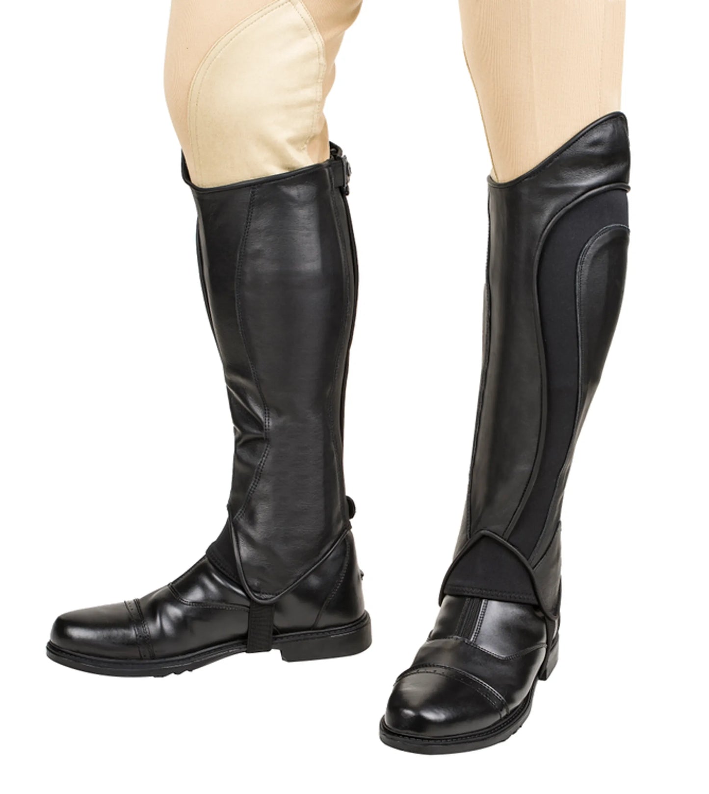 TuffRider Men's Derby Half Chaps in black leather worn over tan riding pants with equestrian boots