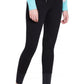 Woman wearing black TuffRider Ladies Ribb Lowrise Wide Waistband Knee Patch Breeches with turquoise long sleeve top.