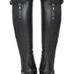Back view of black TuffRider Ladies Belmont Plus Leather Half Chaps with zipper and snap closure on mannequin legs