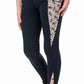 Child wearing TuffRider Kids Minerva 3 Season Printed Knee Patch Tights with printed side panels and black knee patches