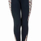 Child wearing black tights with printed knee patches and side panels, TuffRider Kids Minerva 3 Season Printed Knee Patch Tights