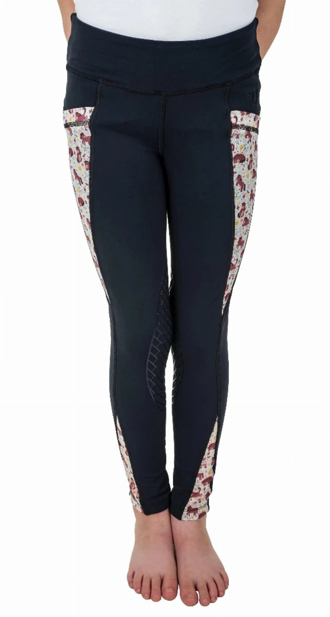 Child wearing black tights with printed knee patches and side panels, TuffRider Kids Minerva 3 Season Printed Knee Patch Tights