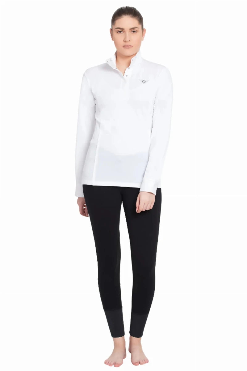 Model wearing Women's Long Sleeve Show Shirt - Quick-Dry Moisture-Wicking Equestrian Competition Shirt in white and black pants.