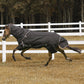 Horse running in field wearing brown TuffRider 4-in-1 Waterproof All Season Blanket with hood and leg straps