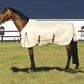 Horse wearing a cream protective TuffRider Power Mesh Fly Sheet standing in grassy outdoor area