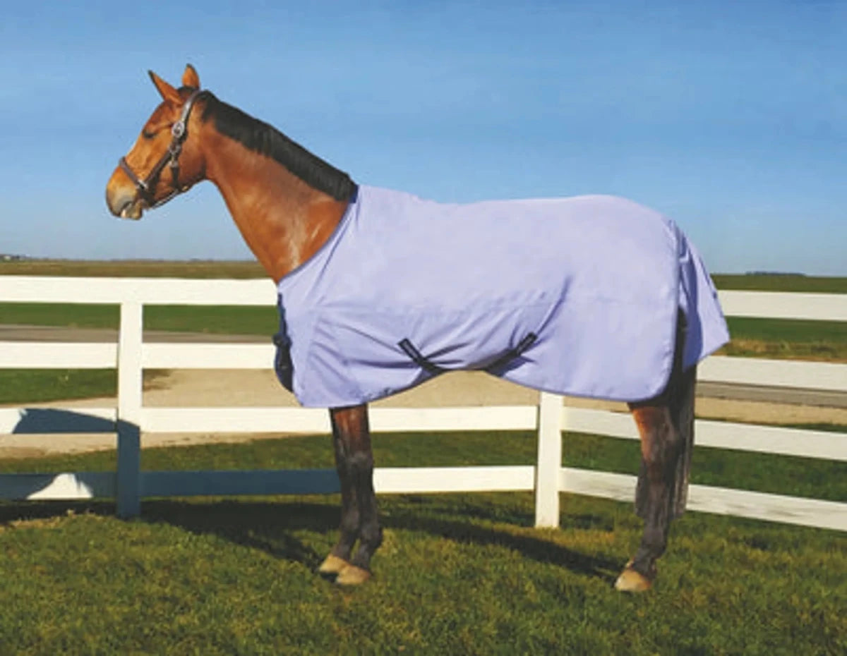 Horse wearing a Waterproof Horse Turnout Sheet - 1200D Ripstop with Coolmax Moisture-Wicking Lining in a fenced pasture.