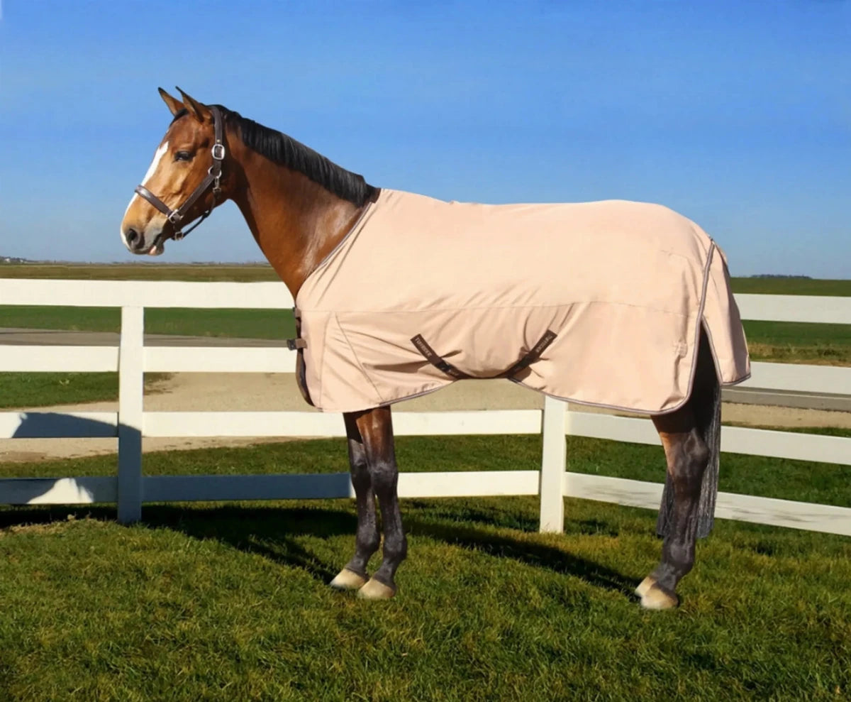 Horse wearing a beige Waterproof Horse Turnout Sheet - 1200D Ripstop with Coolmax Moisture-Wicking Lining outdoors