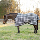 Horse outdoors wearing TuffRider Texilene Shoulder Lining FlyShield Sheet -Black /Grey -66 in grassy fenced area