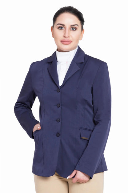 Woman wearing a navy blue TuffRider Ladies Starter Long Show Coat with hand in pocket, posing against white background