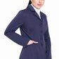 Woman wearing navy TuffRider Ladies Starter Long Show Coat with buttons and beige pants, posing with hand in pocket