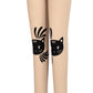 TuffRider Stella Girls Riding Tights in beige with playful black cat face designs on the knees for equestrian activities.