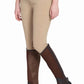 Woman wearing tan breeches and brown Tuffrider Air Mesh Washable Half Chaps with black riding boots