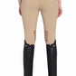 Woman wearing beige riding pants and black boots with TuffRider Ladies Gaiters from an equestrian supply store