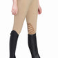 TuffRider Ladies Gaiters black riding gaiters worn over beige breeches and black riding boots for equestrian use