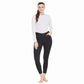 Woman wearing black EQUINE COUTURE HEATHER FULL SEAT BREECH with grip panels, posing in white long sleeve top