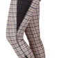 Side view of person wearing EQUINE COUTURE BAKER TIGHTS with plaid and mesh panel details and a close-fitting silhouette