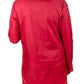 Rear view of a woman wearing a red Equine Couture Ladies Downpour Rain Jacket with long sleeves and a collar.