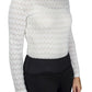 Woman wearing Spicy Girl Pumpkin Long Sleeve Shirt by EC- White- L with a zigzag lace pattern and black pants
