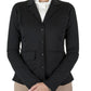 Woman wearing black Equine Couture Ladies Ultra Light Show Coat with beige riding pants on white background