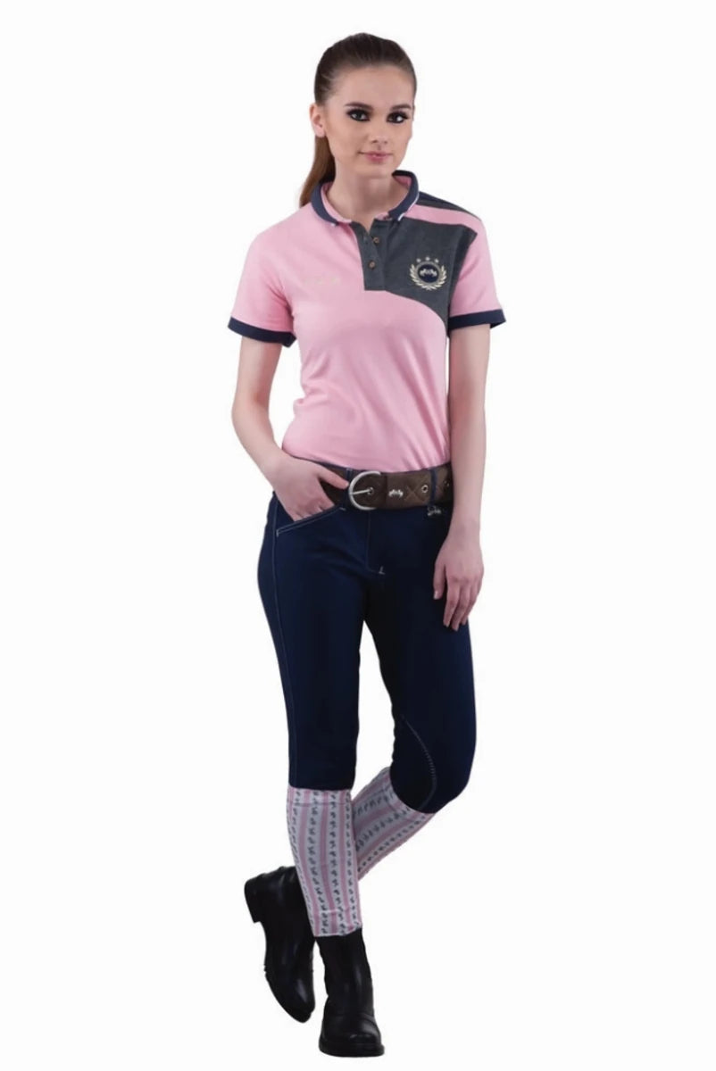 Woman wearing Equine Couture Ladies Sportif Natasha Knee Patch Breeches - UltraGripp Suede Riding Pants with Wide Waistband.