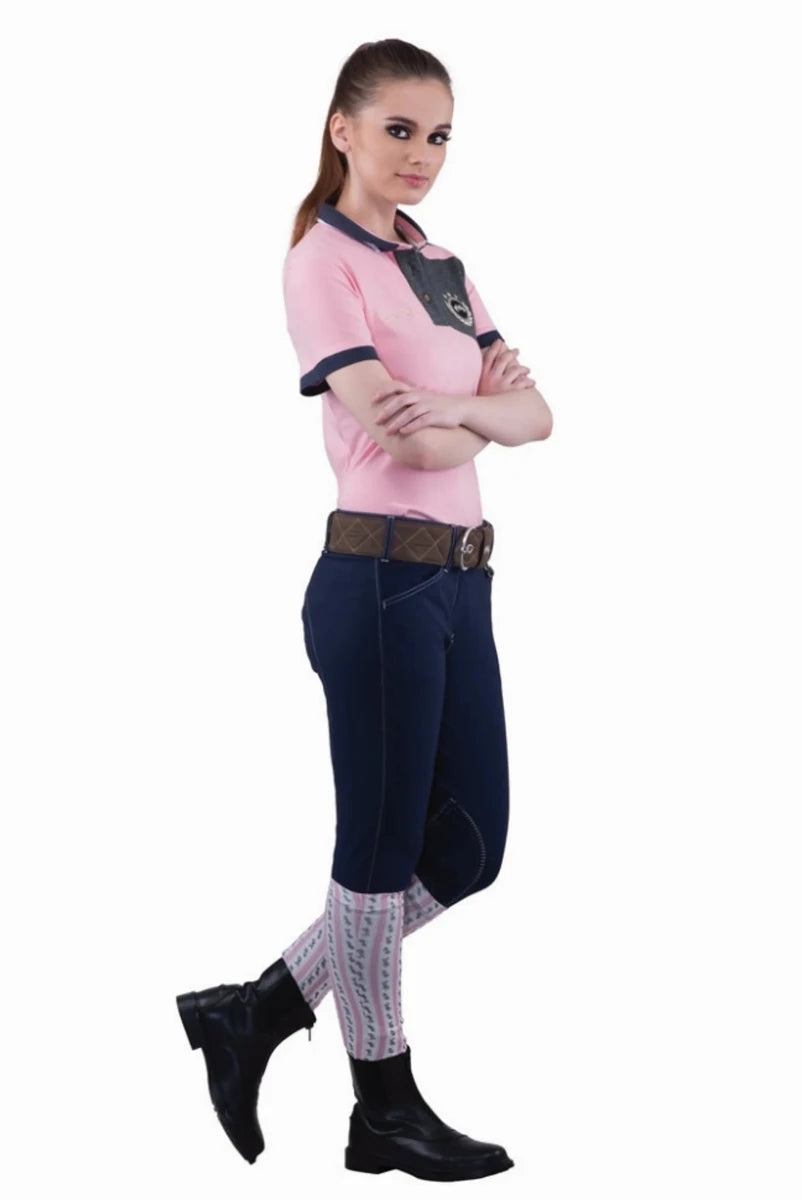 Equine Couture Ladies Sportif Natasha Knee Patch Breeches - UltraGripp Suede Riding Pants with Wide Waistband worn by woman in riding boots