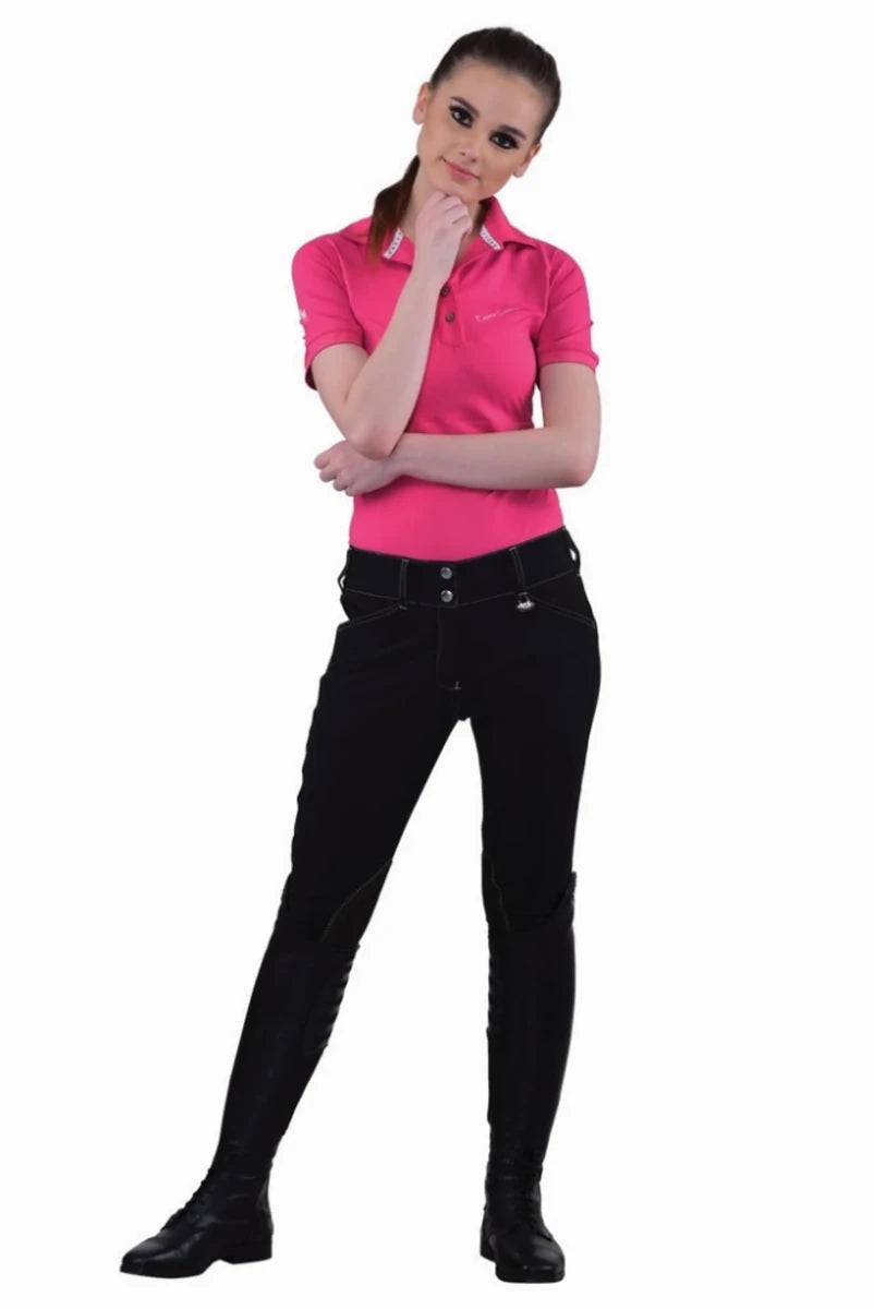 Woman wearing Equine Couture Ladies Sportif Natasha Knee Patch Breeches - UltraGripp Suede Riding Pants with Wide Waistband in black.