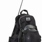 Equestrian Backpack - Water-Resistant Riding Gear Bag with Helmet Compartment holding helmet and riding crop upright