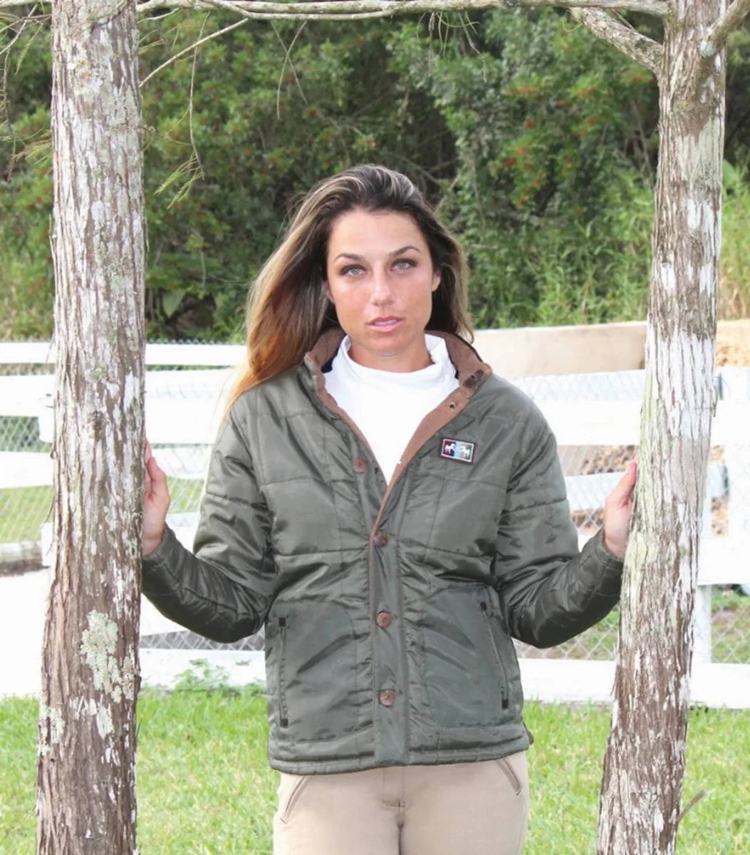 Woman wearing Equine Couture Finley Reversible Jacket - Women's Windproof Riding Jacket with Faux Leather Trim outdoors