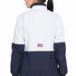 Woman seen from behind wearing Equine Couture Ladies Marmara Rain Shell - Waterproof Breathable Riding Jacket with American Flag Emblem