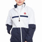 Woman wearing Equine Couture Ladies Marmara Rain Shell - Waterproof Breathable Riding Jacket with American Flag Emblem in white and navy blue