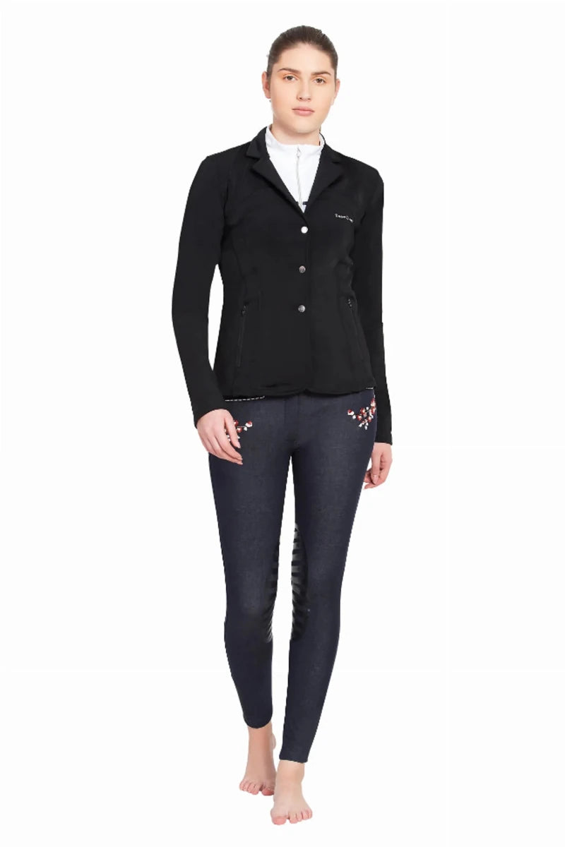 Woman wearing Equine Couture Lacey Ultra Light Show Coat - Women's Breathable Competition Jacket in black, styled for equestrian use.