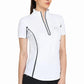 Woman wearing a white EQUINE COUTURE LADIES IBIZA SPORT SHIRT with black piping, styled for equestrian activities.