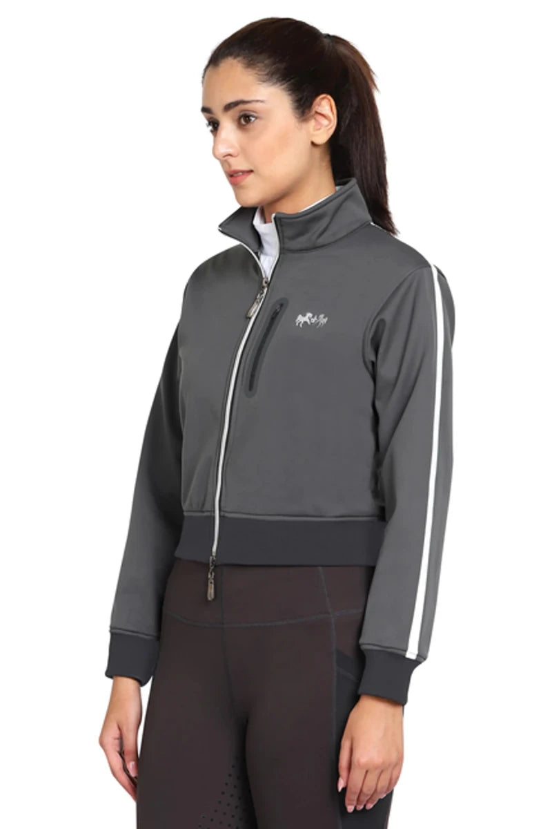 Woman wearing a gray EQUINE COUTURE LADIES PIPPA CROPPED JACKET with white stripe down sleeves and zip front closure