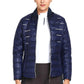 Woman wearing navy blue EQUINE COUTURE LADIES ALPINE PUFFER JACKET designed for equestrian outdoor wear