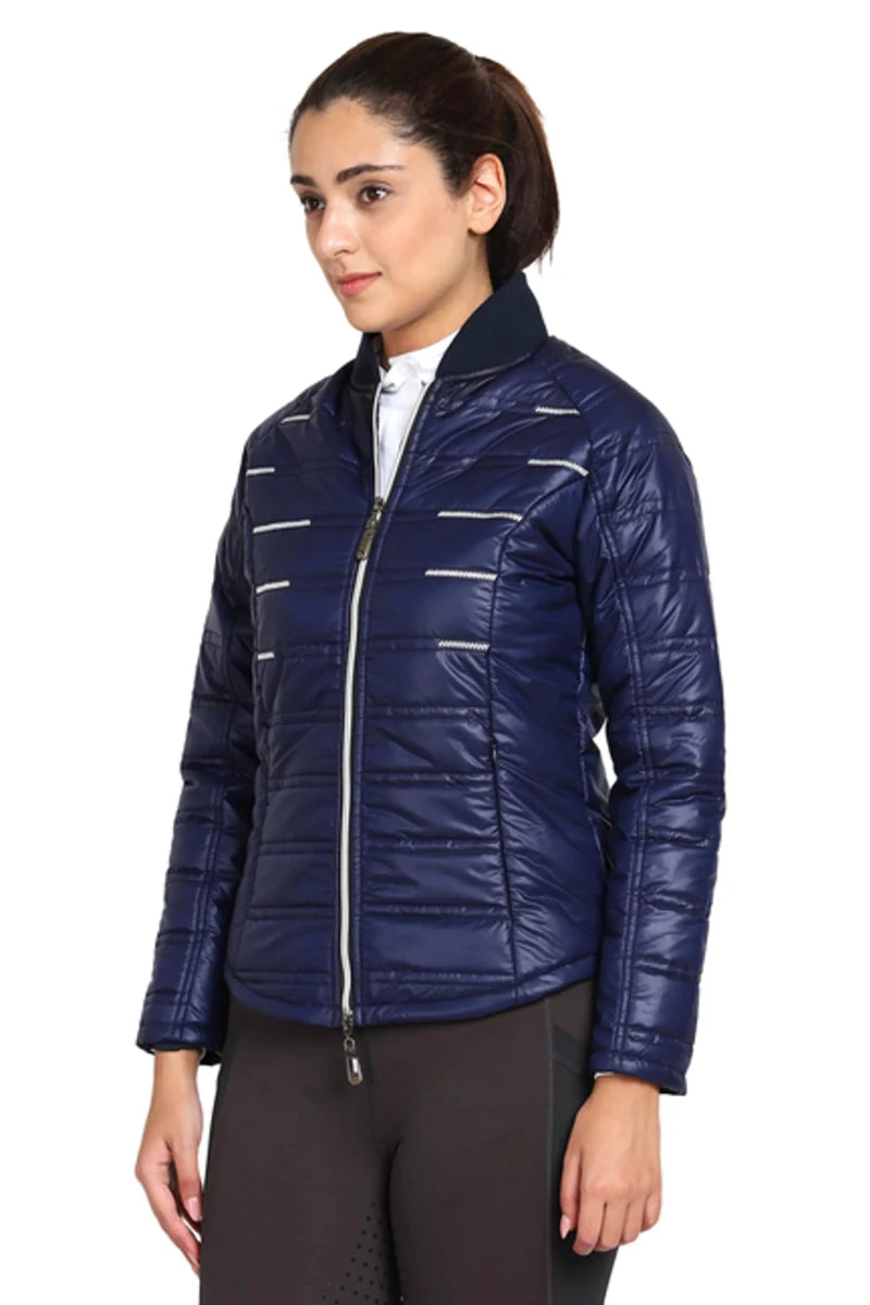 Woman wearing navy blue EQUINE COUTURE LADIES ALPINE PUFFER JACKET standing with hands relaxed at sides