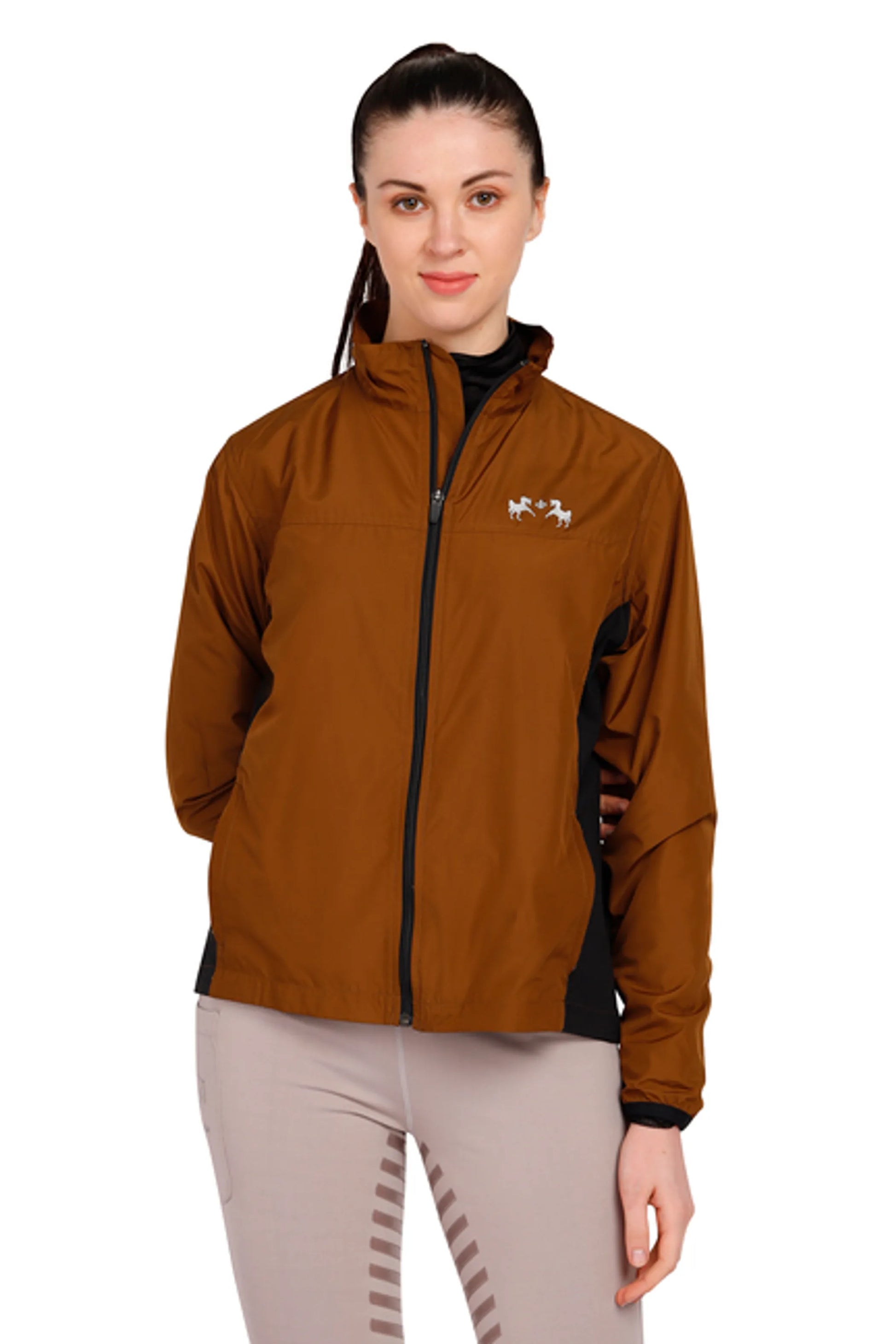 Woman wearing a brown Equine Couture Ladies Aberdeen Jacket with black side panels, styled for equestrian use.
