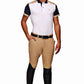 Model wearing Men's Jodhpur Breeches - Bamboo Cotton Riding Pants with UltraGripp Knee Patches styled with polo shirt and riding boots