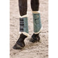 Imperial Riding Brushing Boots IRHLovely in green with fleece lining on a horse’s legs for protection and support.